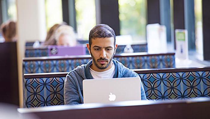 Student working on his computer